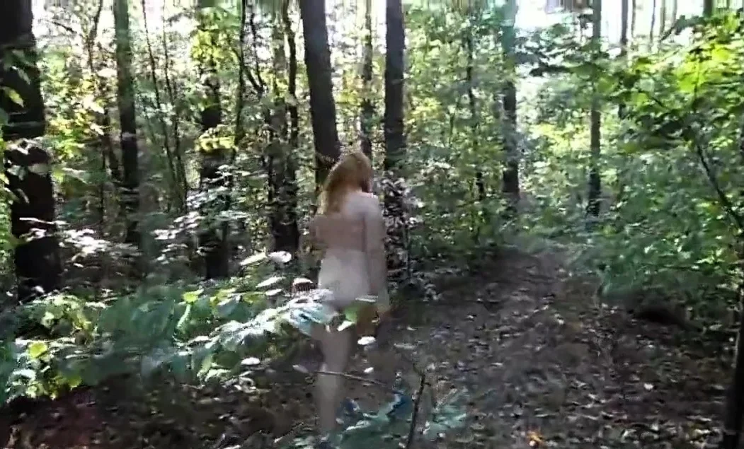 Redhead Amateur Shows Off Her Big Booty in the Forest
