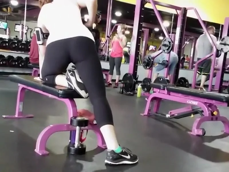Gym watches fit girl's ass