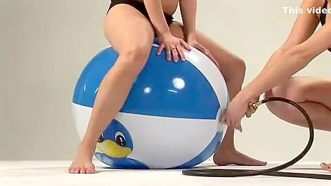 Rebecca and Alexa Duck have a beach ball fun