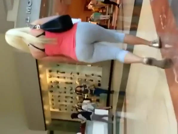 Big ass blonde wearing gray leggings