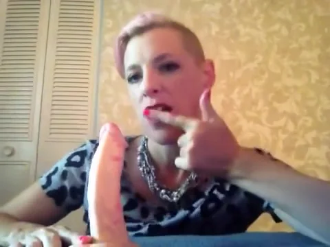 Nicki Skylar deep throats a massive dildo and fills her tight pussy...