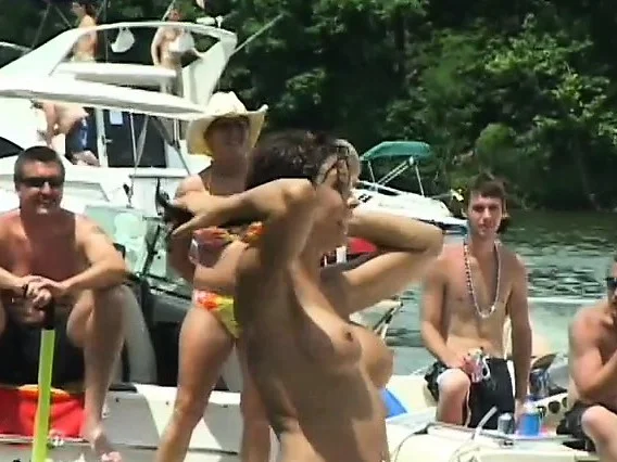 Gorgeous young women on the beach show off their sexy curves