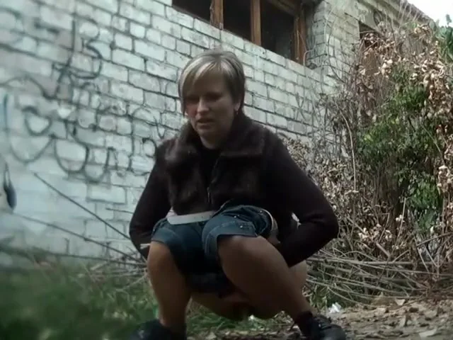 Fashionable milf caught when she pissed