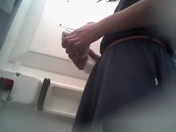 Woman in dress spied in portable toilet pissing