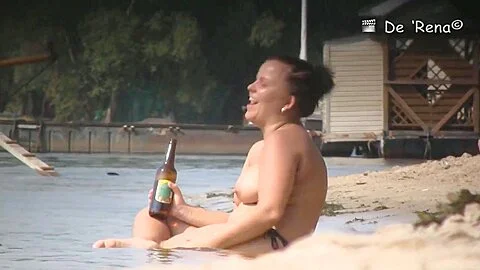 Nude beach voyeur camera shot of sexy well endowed people