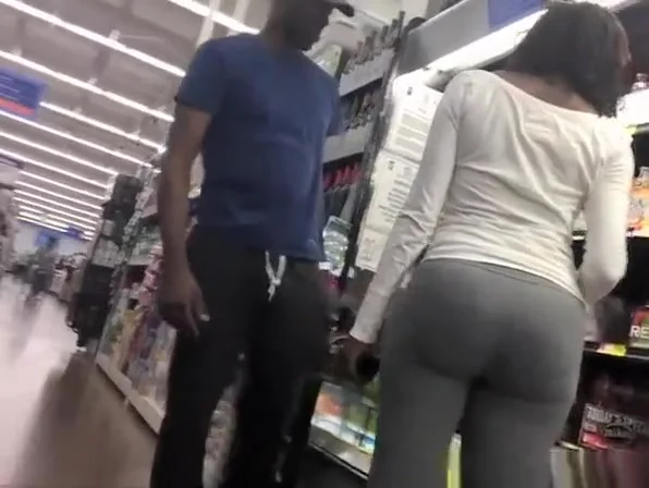 Ebony woman with nice boot in gray leggings