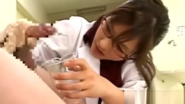 Asian nurse slut jerks off patient