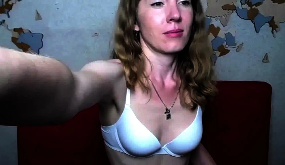 Amateur MILF strips off panties on webcam