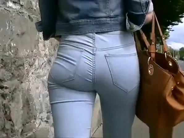Girl in tight jeans pants and jacket