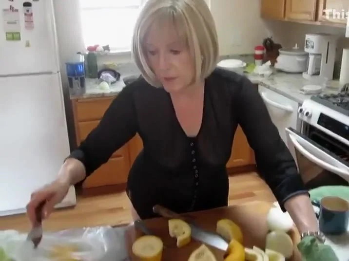 Mature lady spied while baking muffins