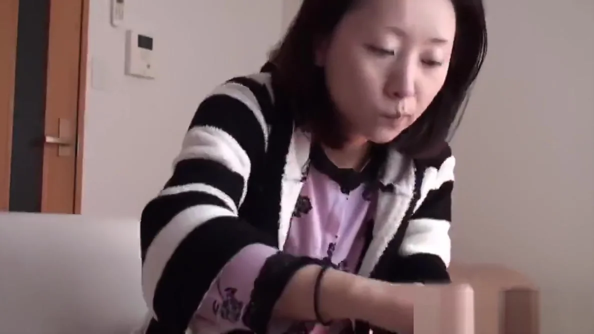 Asian ho pees into cup