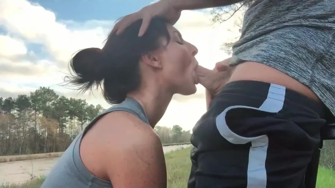 Sexy milf swallows on public nature walk