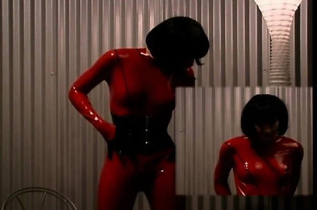 They capture a beautiful model and give her a latex body suit