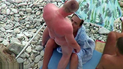 Double penetration at the beach