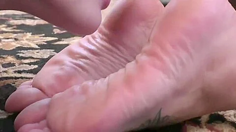 Young Girl Licks Mature Woman`s Feet