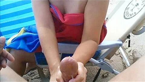 Compliation of Beach tugjob and large cumshots