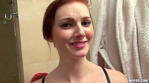 Gorgeous redhead Natalie Lust gives head after shower