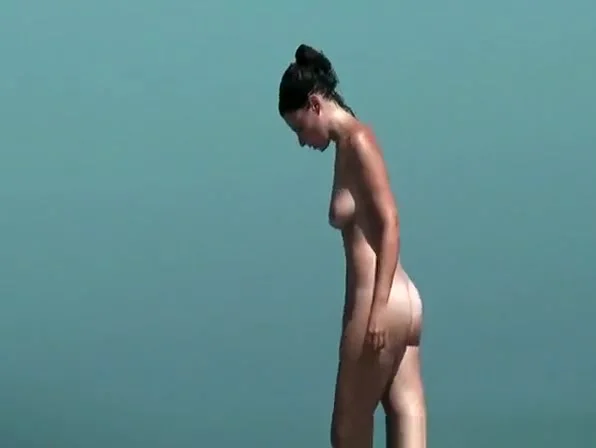 Nudist and topless women on the beach