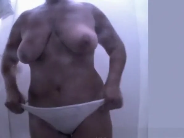 Chubby woman with big tits and hairy pussy spied