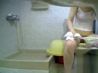 This girl is caught in the bathroom on