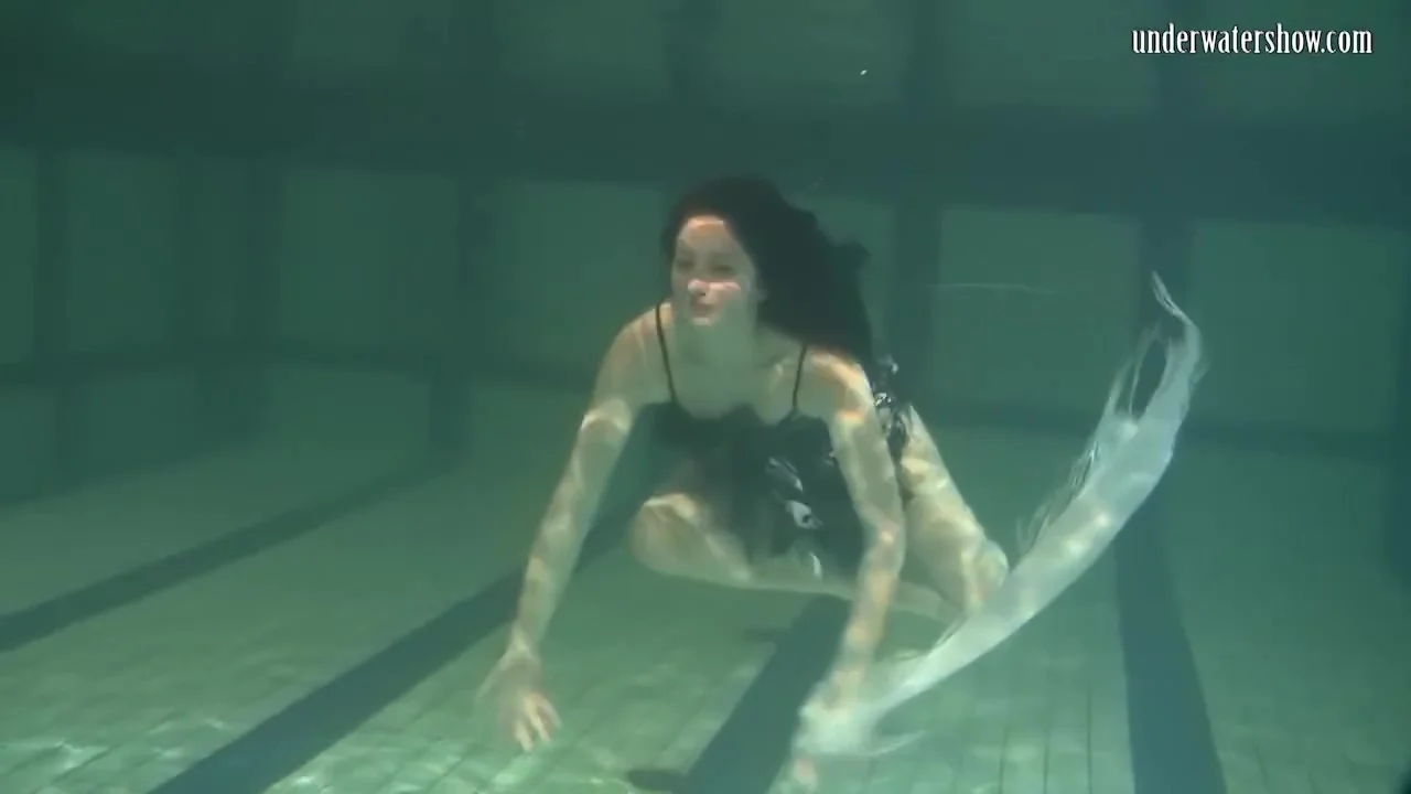 Dressed Up teen 18+ Irina Barna Swims Sexy In The Pool
