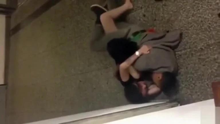 couple copulating on the hallway floor