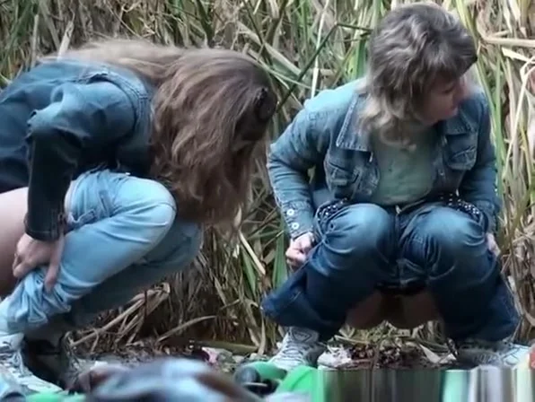 Three women secretly filmed pissing outdoors