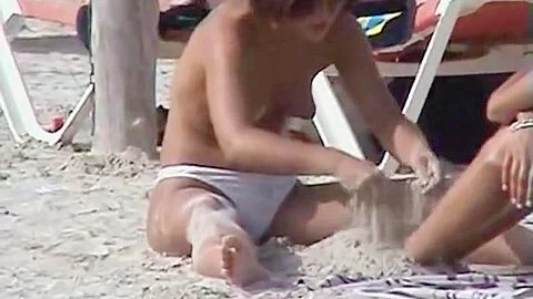 Nudist beach is full of seductive naked women