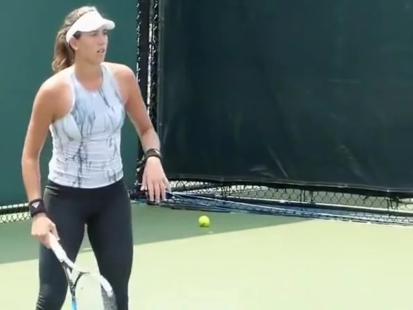 Tennis player wearing spandex pants