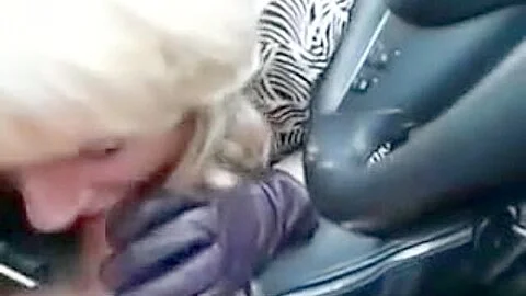 Mature woman doing a blowjob in the car