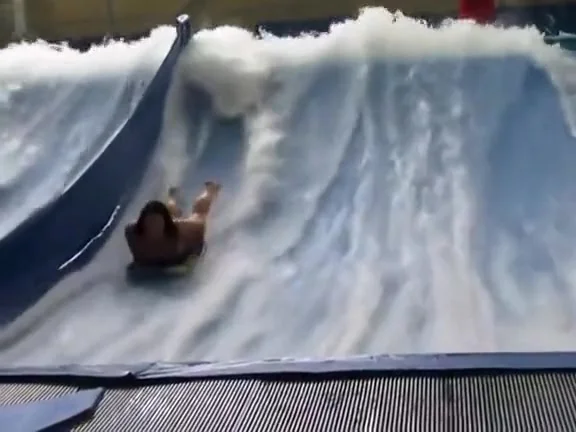 Bouncing big tits at the water park