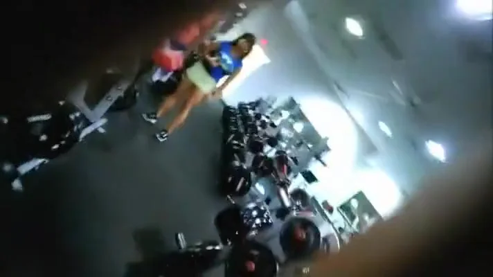 Firm muscular body checked out in a gym
