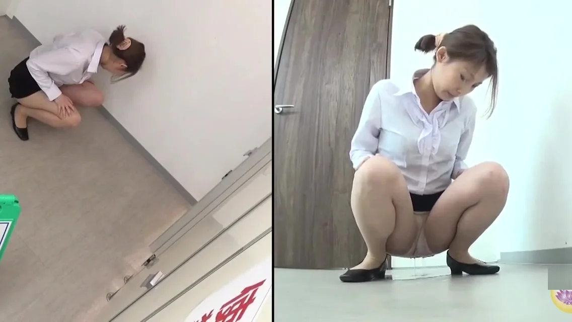 Japanese wetting herself in the bathroom