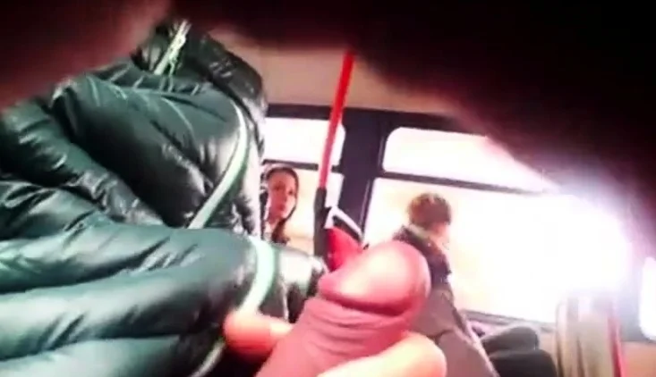 Two girls watch bus flasher