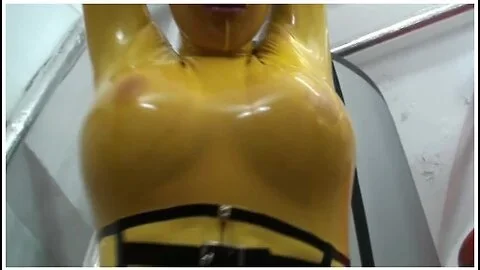 Girl Full Encased In Yellow Latex Catsuit + Fishnets Makes Self Bondage