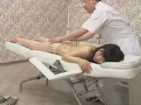 Shy Japanese with small tits has massage