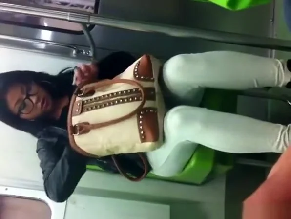 Brunette woman in tight pants