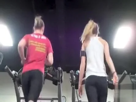 Athletic asses in spandex on the treadmill