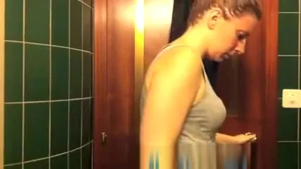 Cute girl changing in bathroom