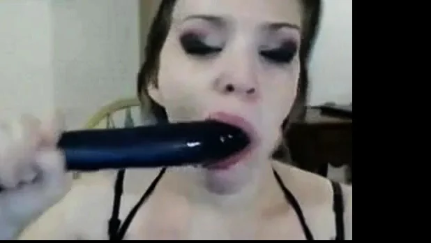 Cam girl dildos her mouth...