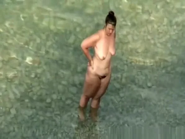 Chubby nudist woman with hairy pussy