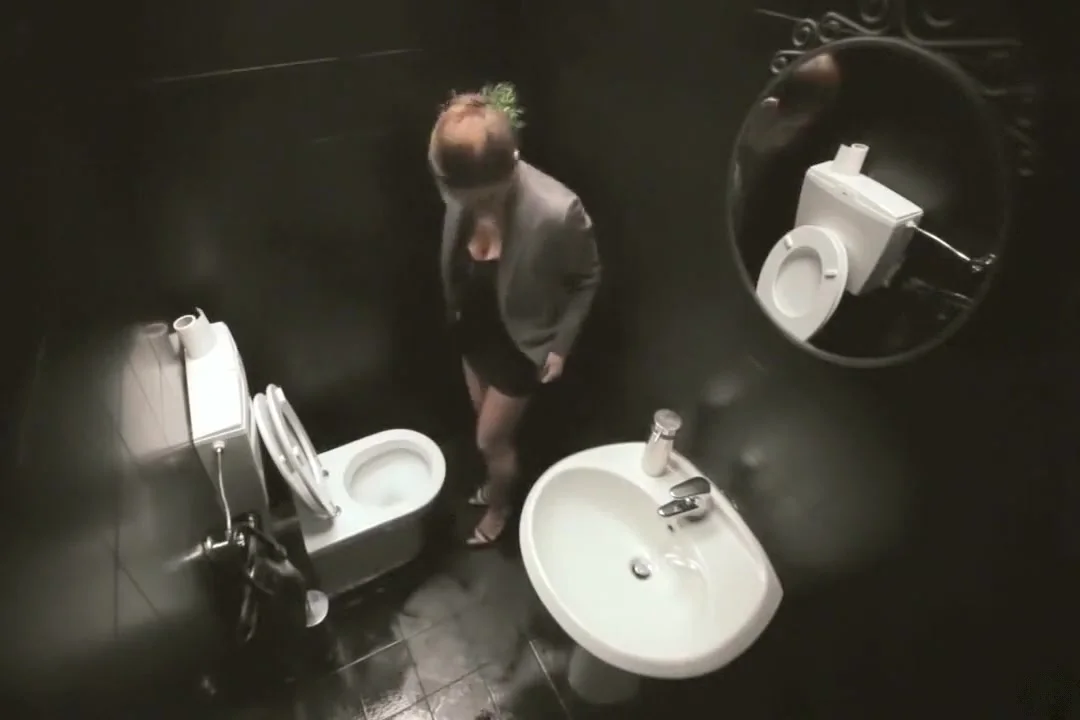 Public service announcement with a woman using a toilet