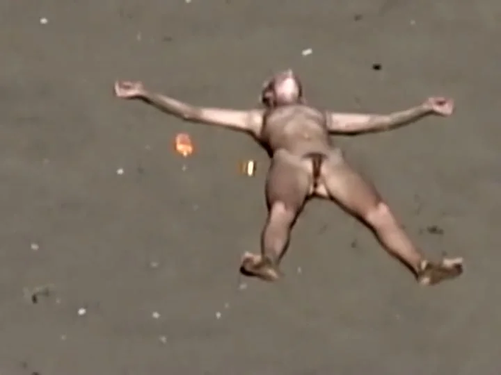 Dirty nudist girl on the beach