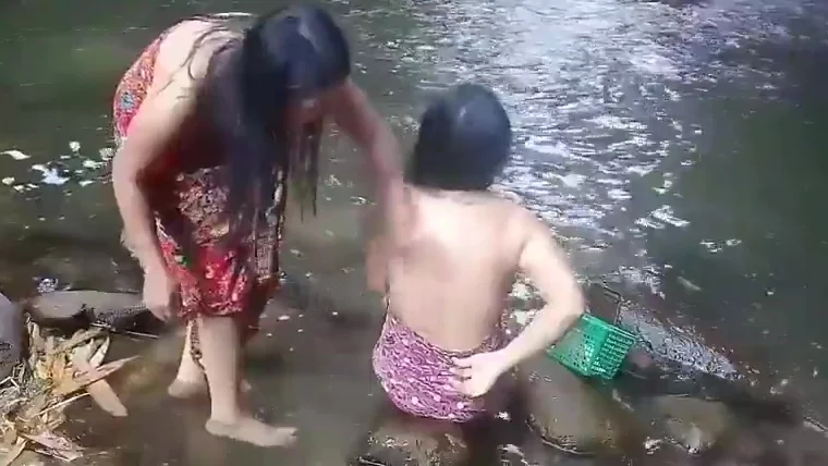 Beautiful girls having bath outdoor