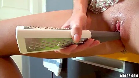 Golden haired Summer Breeze plays with her nookie in kitchen