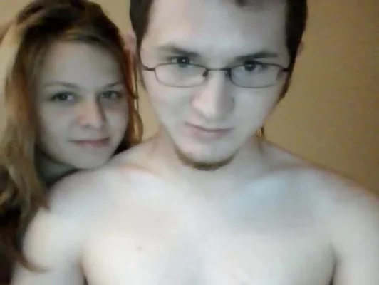 Chubby babe rides a fat cock on the bed for the webcam