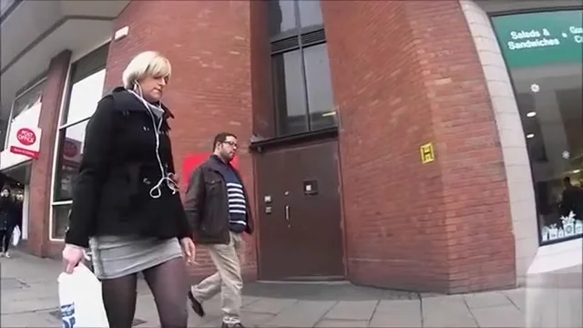 Boots and tights on a blonde on the street