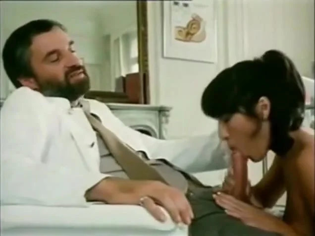 Bearded doctor being sucked by nurse