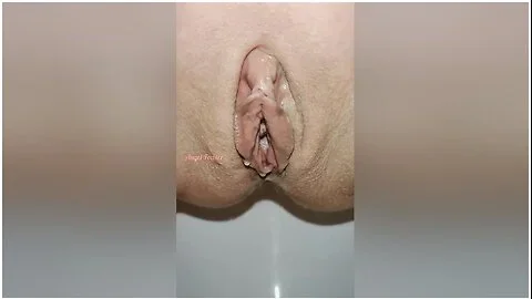 Beautiful Bald Pussy Of Petite Milf Makes The Big Powerful Urine Fountain Close Up