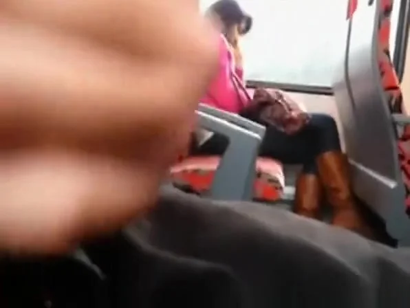 Guy strokes his cock in train